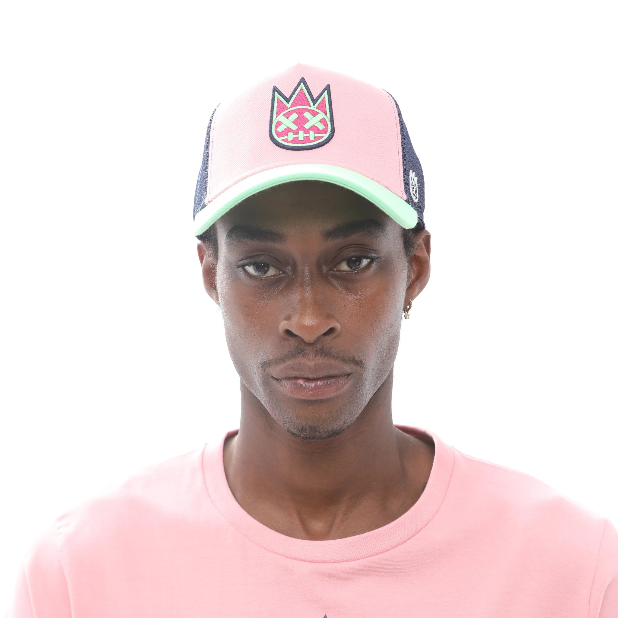 Cult of Individuality (candy pink clean logo mesh back trucker hat)