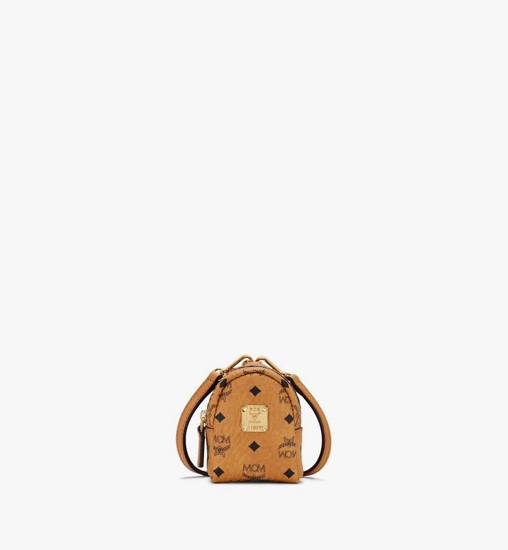 MCM (cognac Backpack Charm with Crossbody Strap in Visetos)