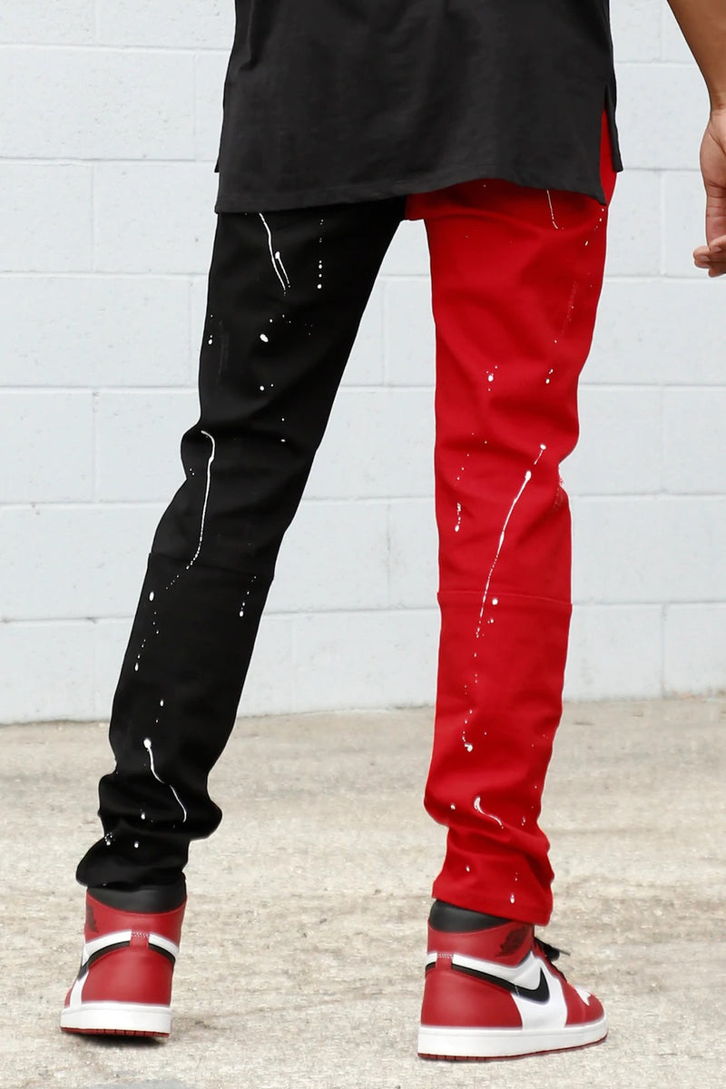 Kdnk (black/red paint splatter contrast stacked jean)