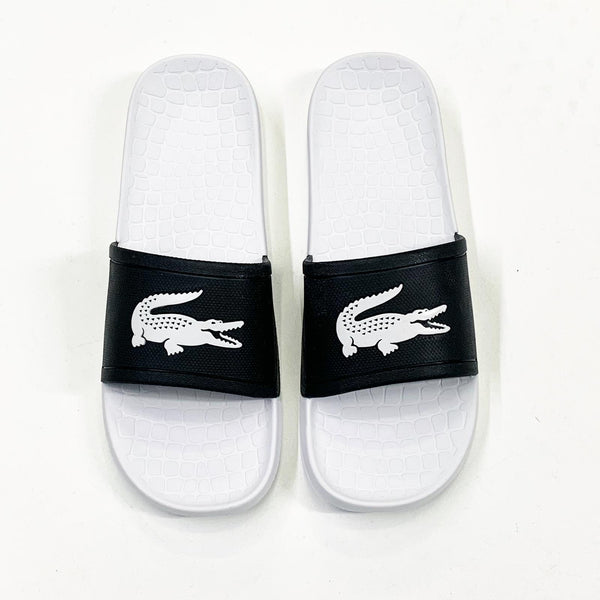 Lacoste (men’s black/white croc slides)