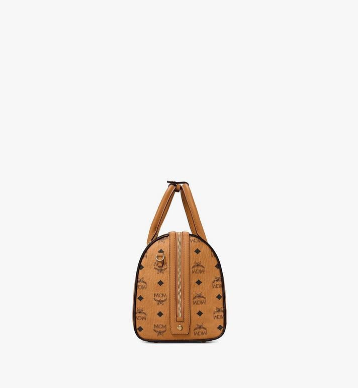 MCM (cognac small  Essential Boston Bag in Visetos Original)